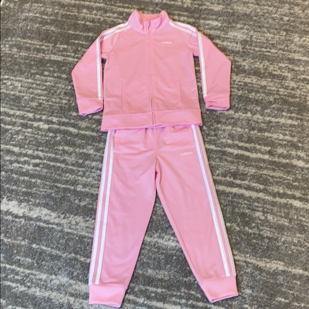 Pink track suit